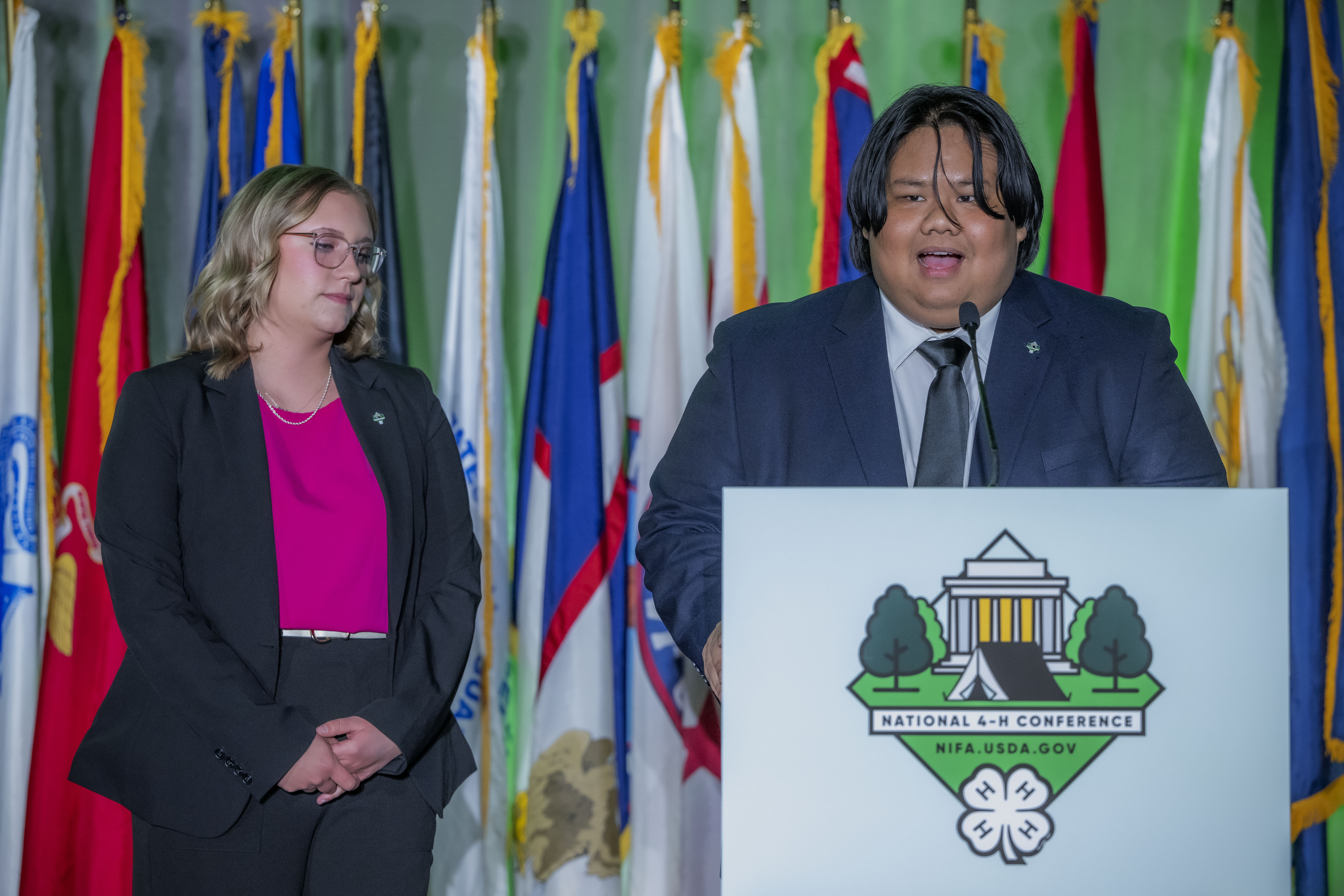 Rownel Jody Coloma, right, a Northern Marianas College alumnus and former 4-H Marianas State Youth Council president, introduces the collegiate facilitators at the 2025 National 4-H Conference in Washington, D.C 