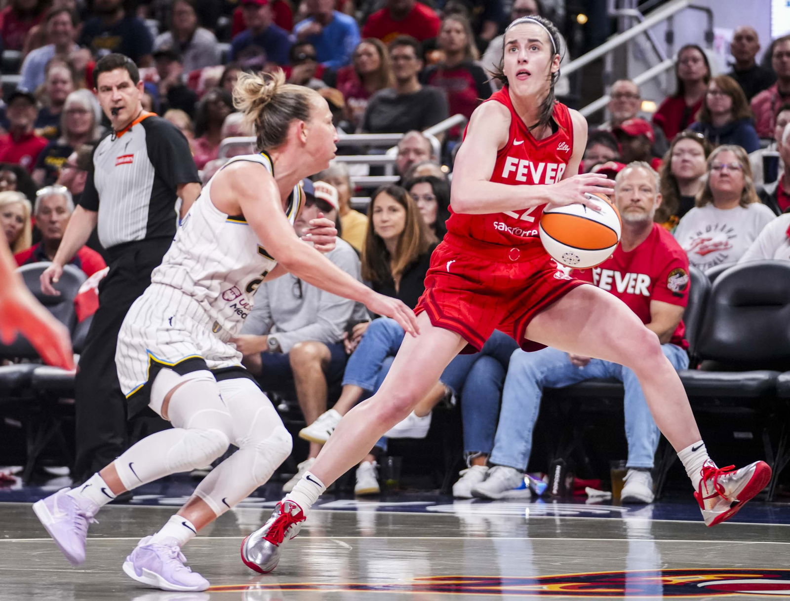 Indiana Fever guard Caitlin Clark (22) attempts a 3-pointer Saturday, May 17, 2025, during a game between the Indiana Fever and the Chicago Sky at Gainbridge Fieldhouse in Indianapolis, May 17, 2025.Photo by Grace Smith/IndyStar via Imagn Images