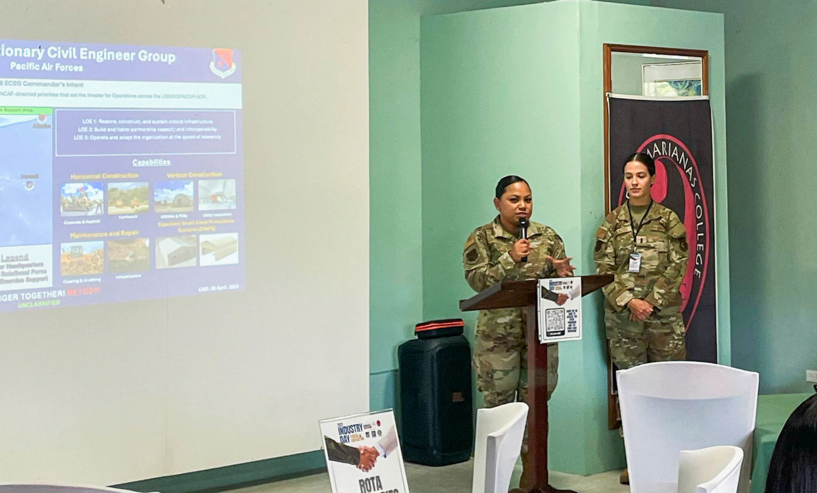 1st Lt Julieth Collazos and MSgt Sheleena Cruz from the Pacific Air Forces presenting to the Rota Industry Day attendees.
