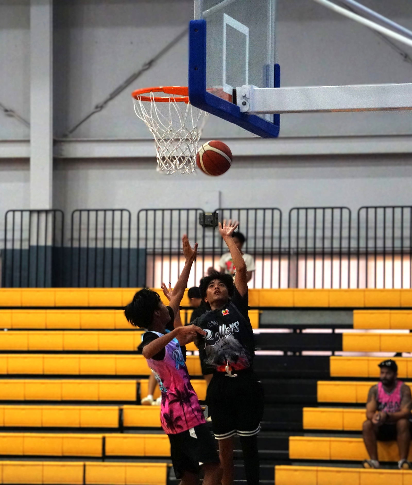 TurnKey Solutions’ Jairus Pangelinan takes the contested layup during a game against Rollers 4 in the U18 boys division of the 2025 APEC Basketball League at the Ada gym on Saturday.Photo by James F. Sablan Jr.
