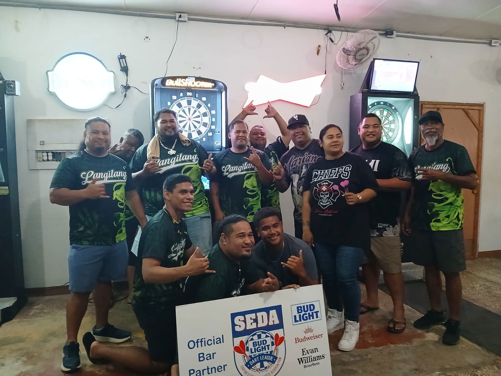 True North Langilang and Last Shot Taya Mana'i players pose for a group photo after their Thursday Flame Tree B Division game in the 2025 SEDA Bud Light Dart League at the True North Bar on Thursday last week.Contributed photo