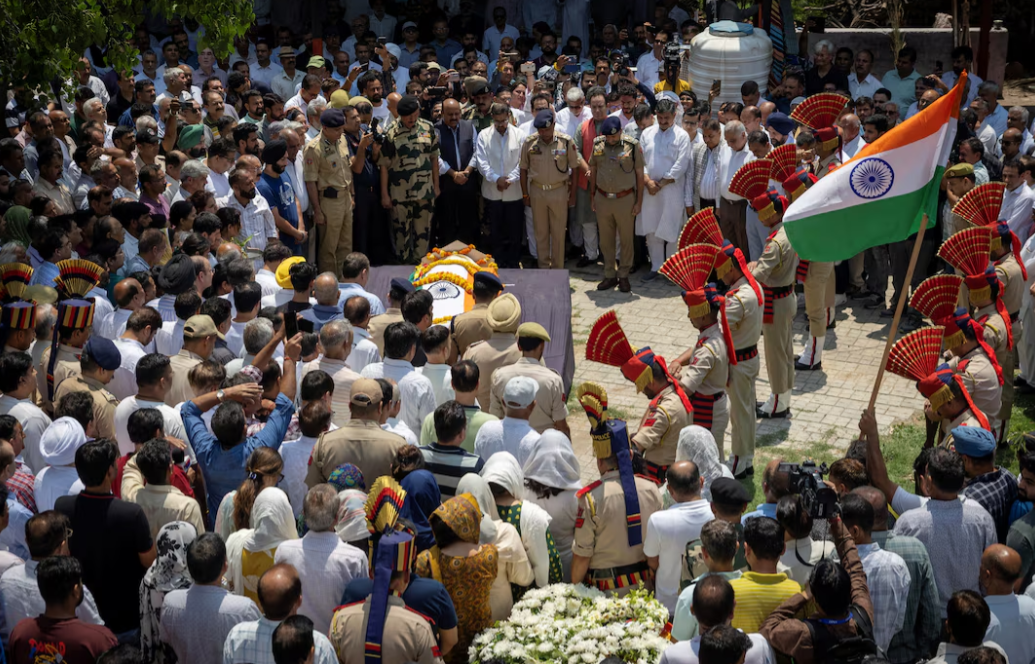 Indian policemen pay their respects during the funeral of Raj Kumar Thapa, a senior government official who was killed in a cross-border shelling between India and Pakistan, in Roop Nagar, Jammu May 11, 2025.REUTERS
