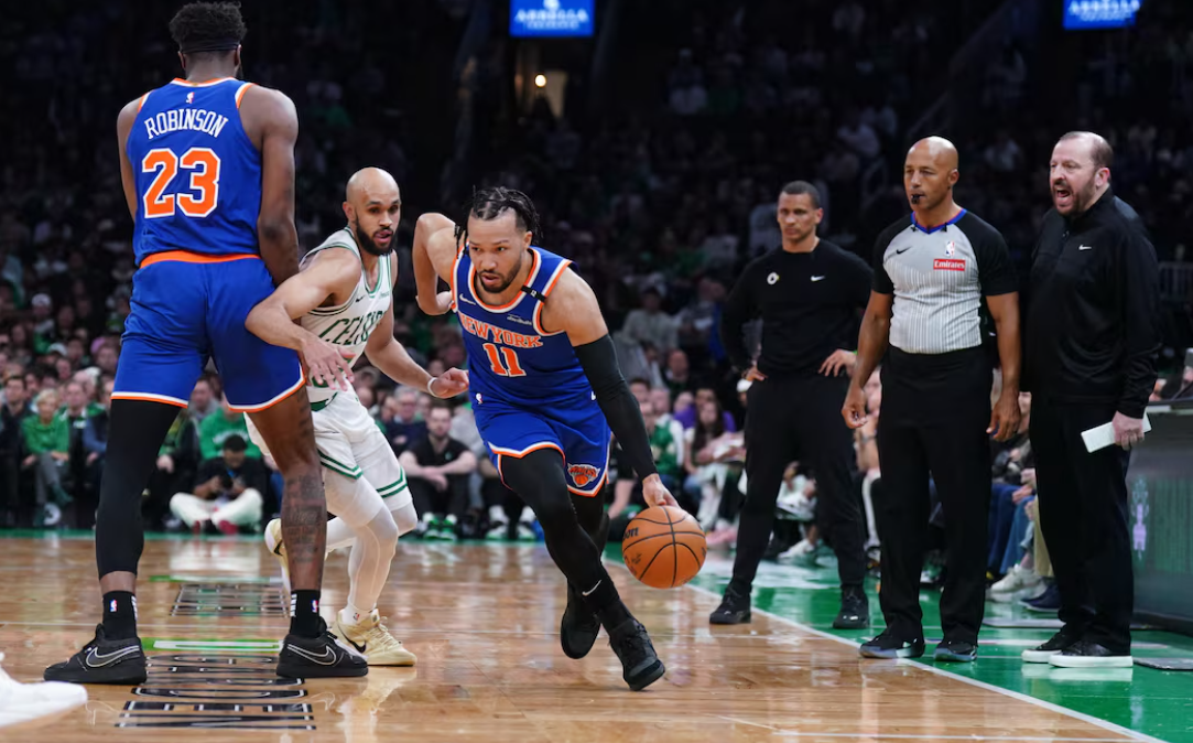 New York Knicks guard Jalen Brunson (11) drives the ball against Boston Celtics guard Derrick White (9) in the second quarter during game one of the second round for the 2025 NBA Playoffs at TD Garden in Boston, Massachusetts, May 5, 2025.Photo by David Butler II-Imagn Images