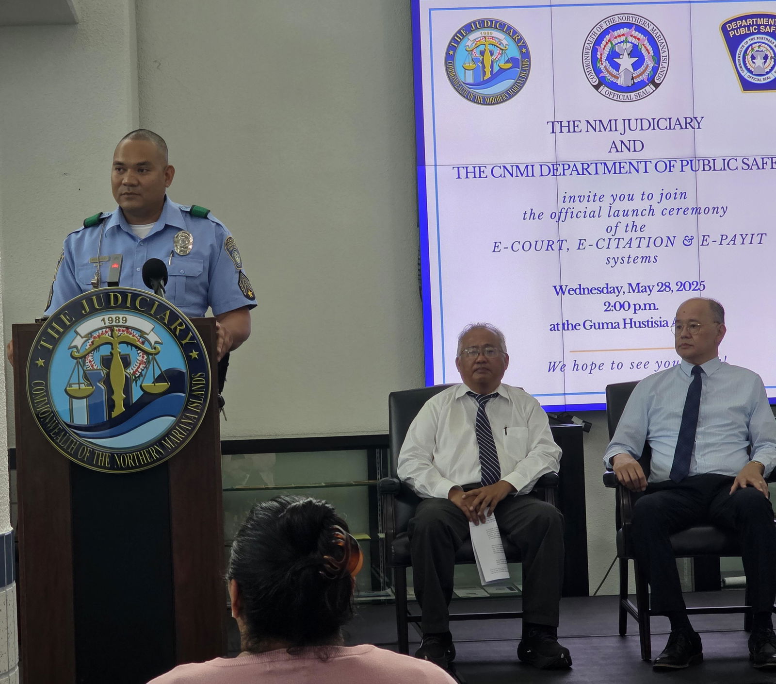 DPS Highway Patrol Section Sgt. Adrian T. Mendiola delivers his remarks while Supreme Court Justice John Manglona and Presiding Judge Roberto C. Naraja look on.Photo by Bryan Manabat