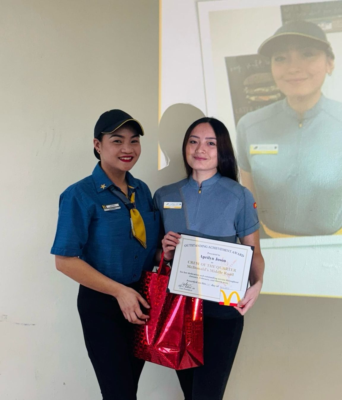 From left, Angelica Darlucio, McDonald’s Middle Road acting general manager, and Aprilyn Joson, McDonald’s Middle Road Crew of the 1st Quarter.Contributed photo—