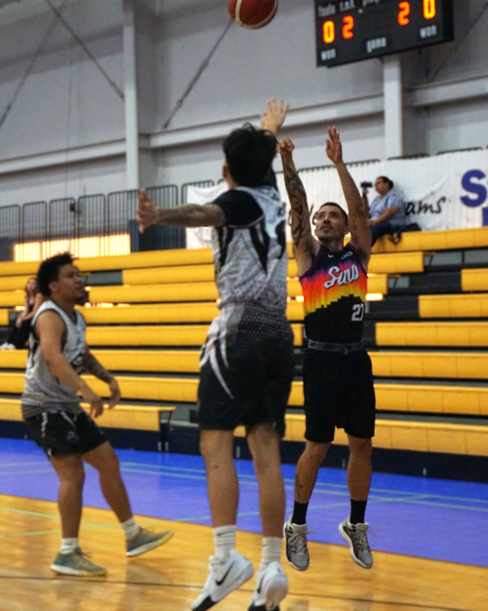 Suns’ Don Brennan pulls up for the contested three-point shot during a game against Eastside Cuts/Elite Kuyas in the Michelob Ultra Cup 2025 at the Ada gym on Tuesday.Photo by James F. Sablan Jr.
