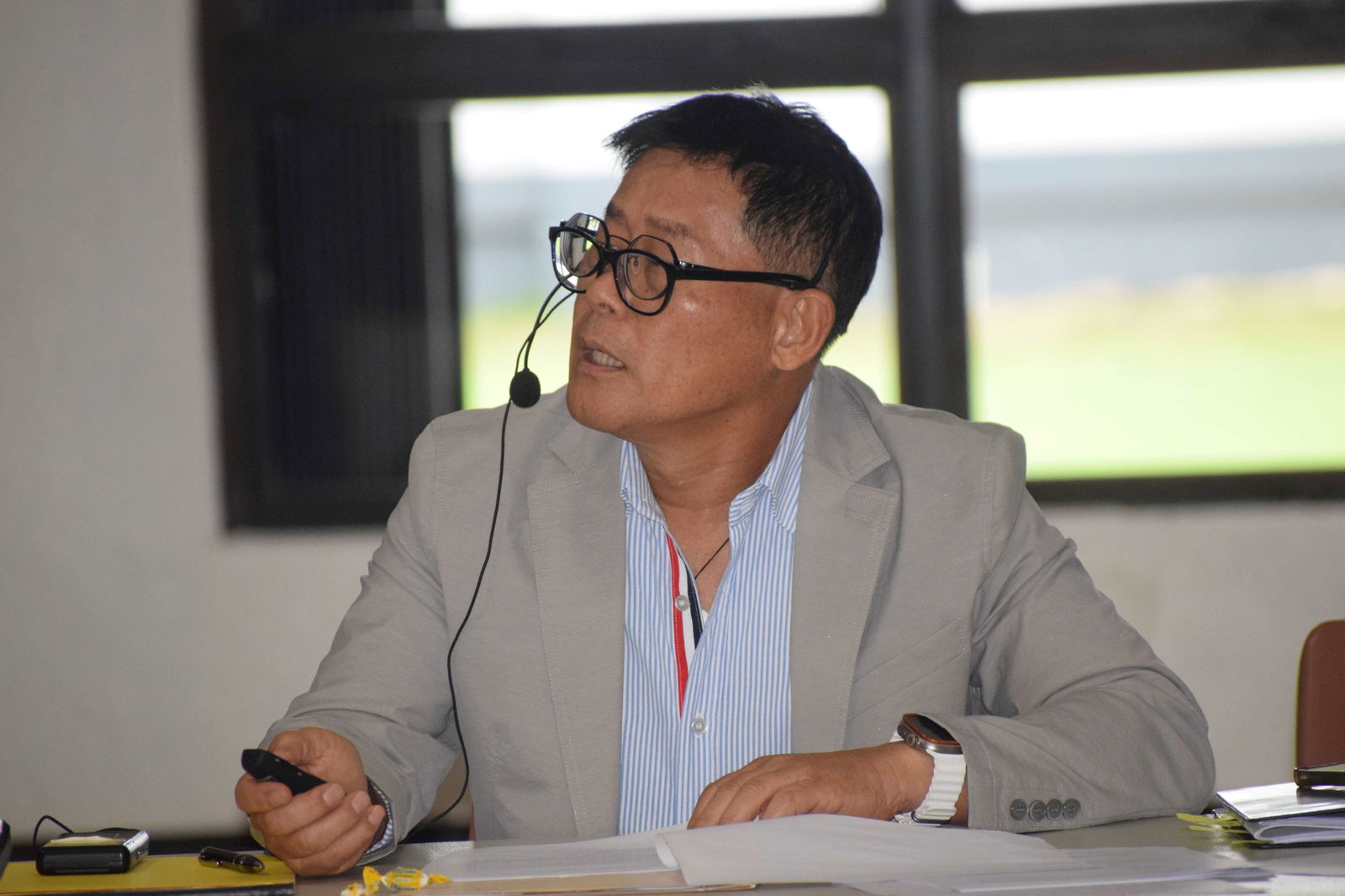 Zoning Board member Steve Jang speaks during his presentation at the multi-purpose center in Susupe on Tuesday.