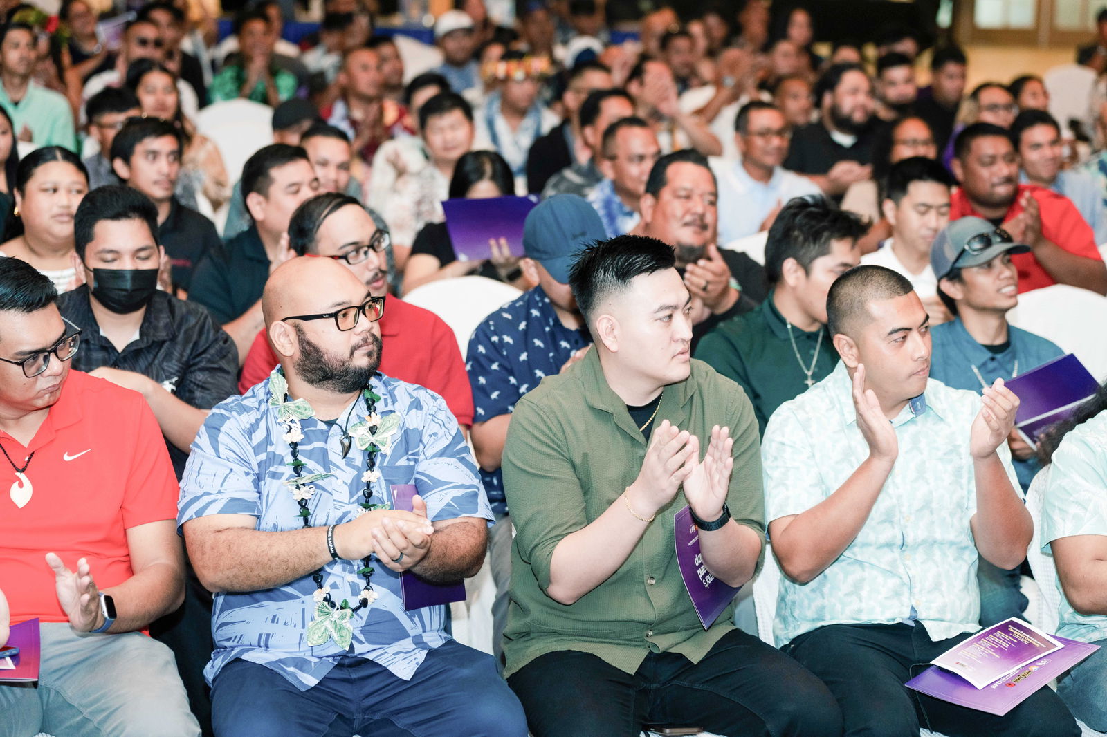 Participants cheer after receiving their certificates of completion.