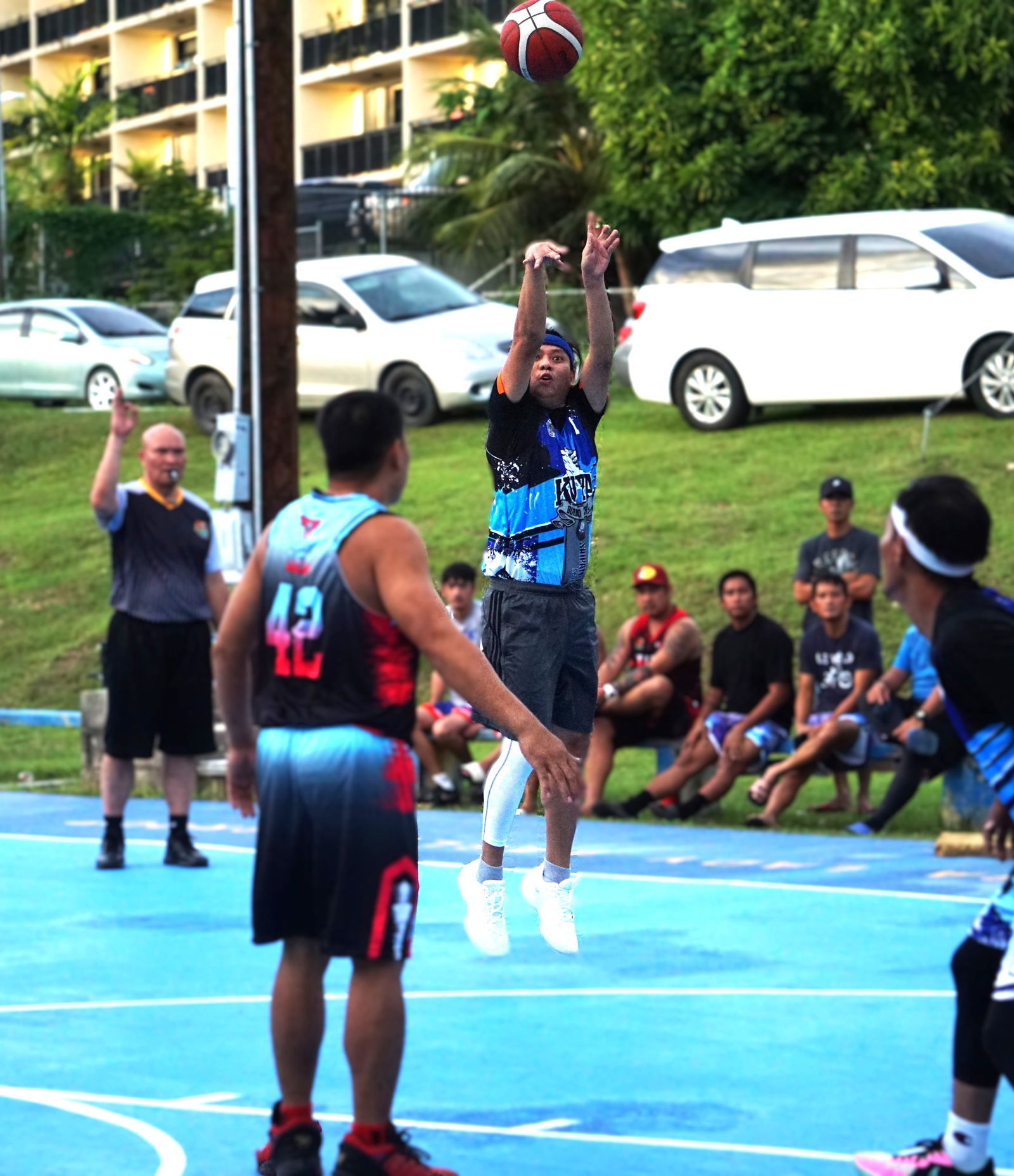 Eagles Kuya’s Gerald Anciete takes a three-point shot during a game against Lakay in the E-Sports CNMI Invitational Basketball League 2025 at the Gualo Rai basketball court.