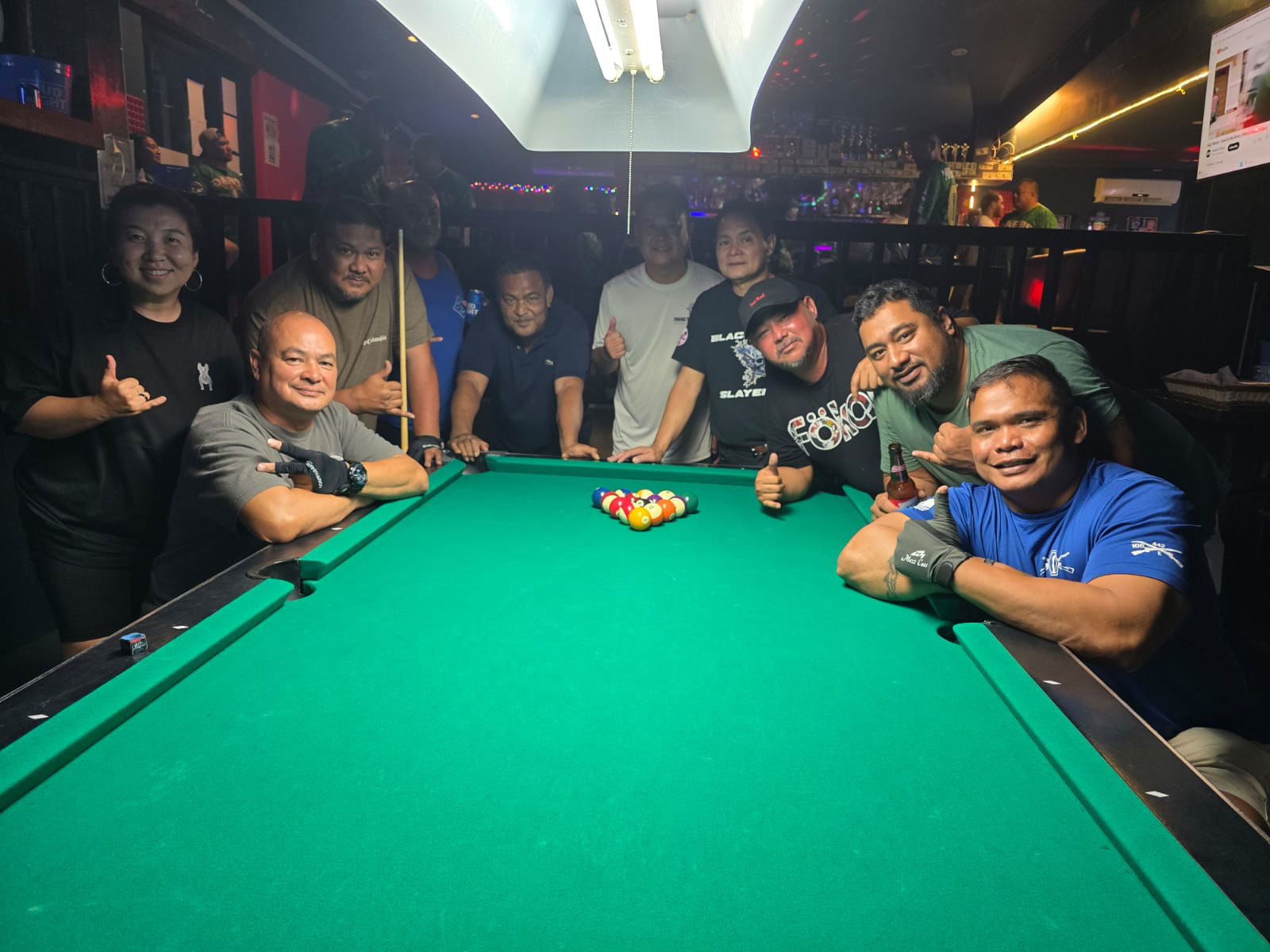 Black 8 Rack N Roll 2 and Crooked Arrow 2 players pose for a group photo after a match in the Thursday Division of the 2025 SBA Budweiser Open 8-Ball League at the Black 8 Poll Bar.Contributed photo