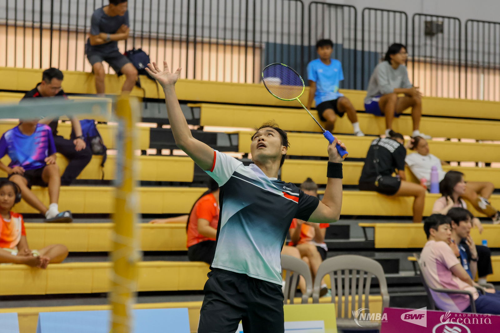 NMI's Rolando Gallardo winds up for a smash return against Tahiti’s Teo Chagnot during a men's singles match of the Northern Marianas International 2025 at the Ada gym on Tuesday.Northern Marianas Badminton Association photo