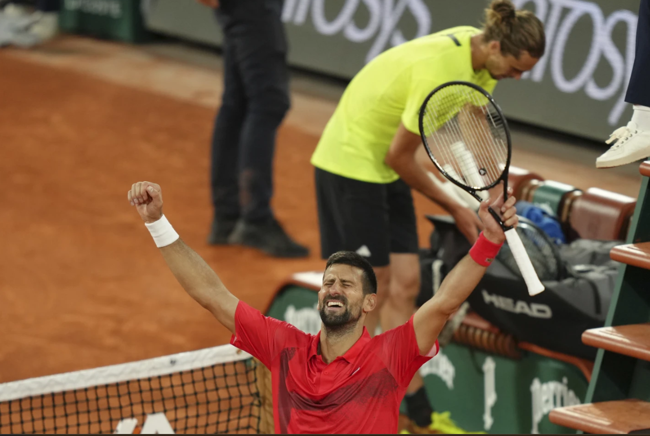 Serbia’s Novak Djokovic celebrates winning his French Open quarterfinal match against Germany’s Alexander Zverev at the Roland Garros stadium in Paris, Wednesday, June 4, 2025.AP