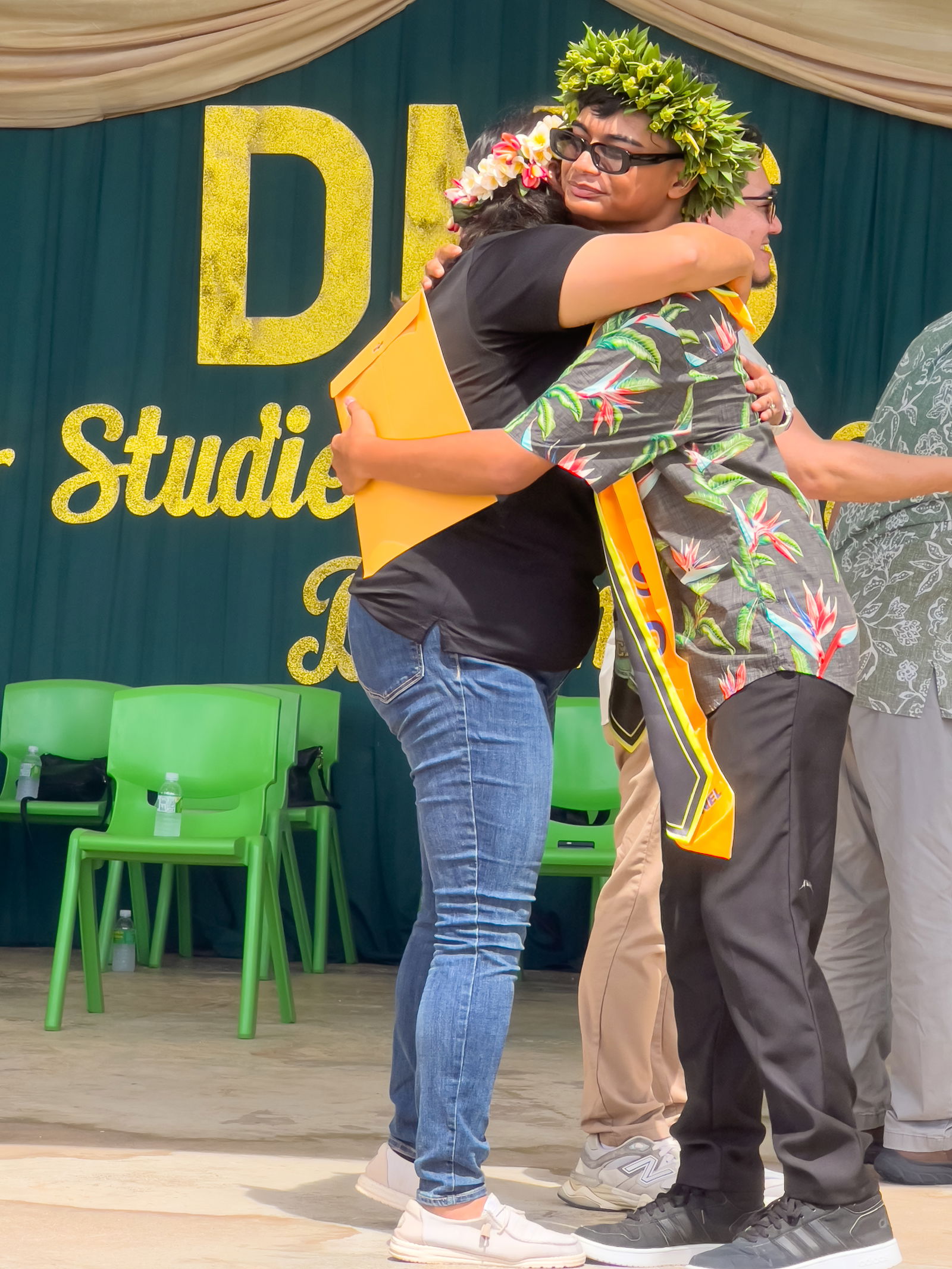 A special moment for a promoted student.