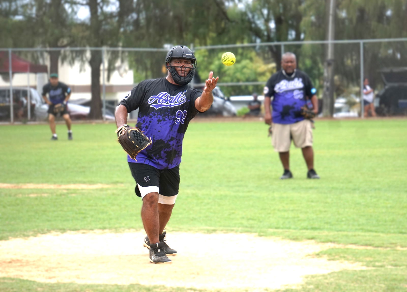 Asahi's Dom Hideo pitches against Peliliu during a masters division game of the 2025 Belau Amateur Softball League at the Dandan ballfield on Sunday.Photo by James F. Sablan Jr.