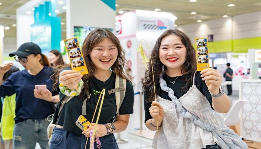 Attendees visit the Marianas Visitors Authority booth at the Seoul International Travel Fair held on June 5-8, 2025, in South Korea. The fair attracted over 45,000 attendees and featured over 500 booths.