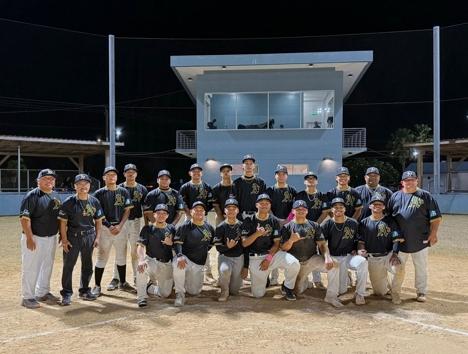 The Athletics pose for a group photo after winning a game in the 2025 Saipan Baseball League at the Francisco "Tan Ko" Palacios Baseball Field.Contributed photo