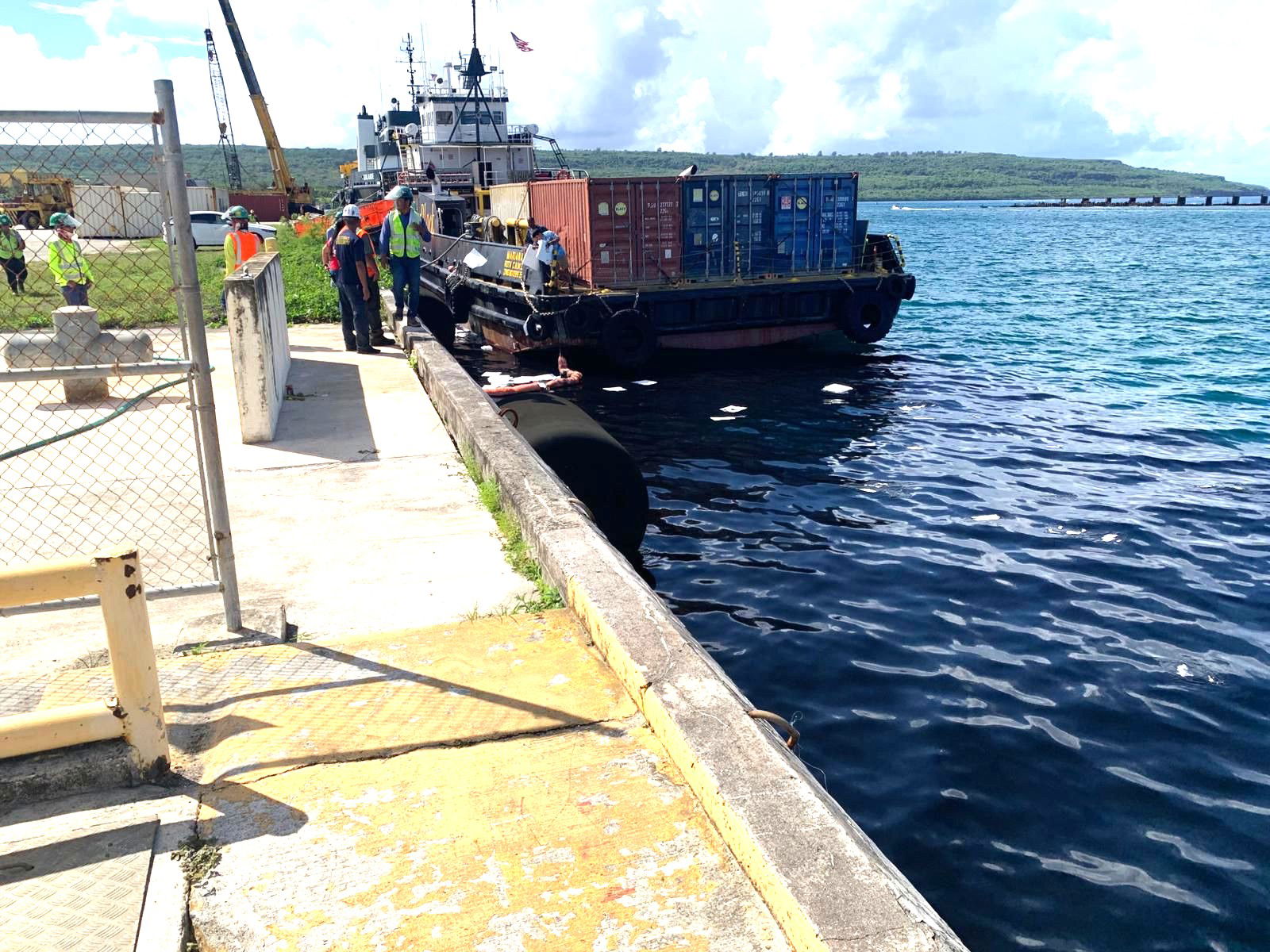 Responders actively address a reported waste oil spill from the 145-foot U.S.-flagged freight ship Mariana at the Tinian Harbor on June 6, 2025.Courtesy photo/USCG