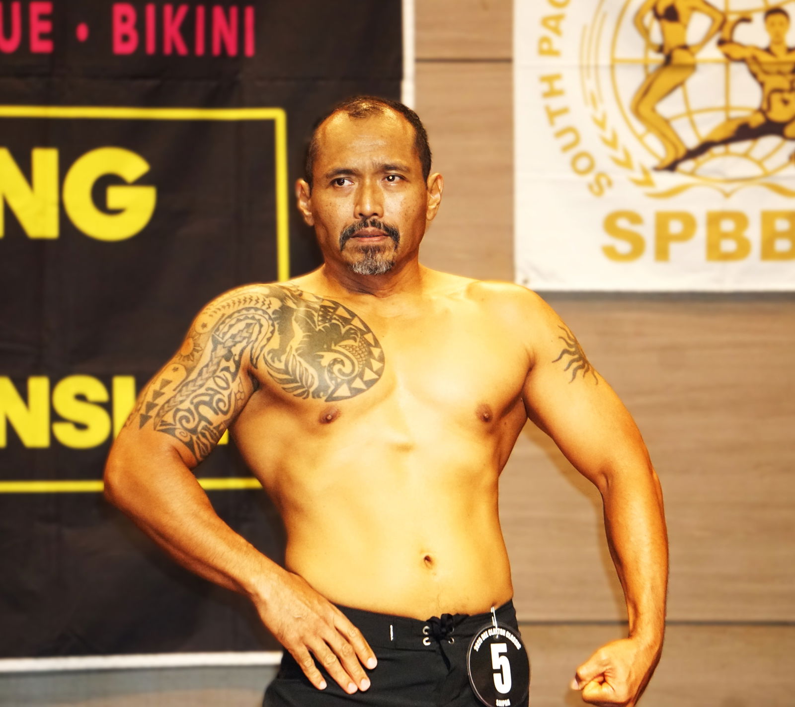 Randy Pagapular strikes as pose as he competes in the masters division of the men's physique category.Photo by James F. Sablan Jr.