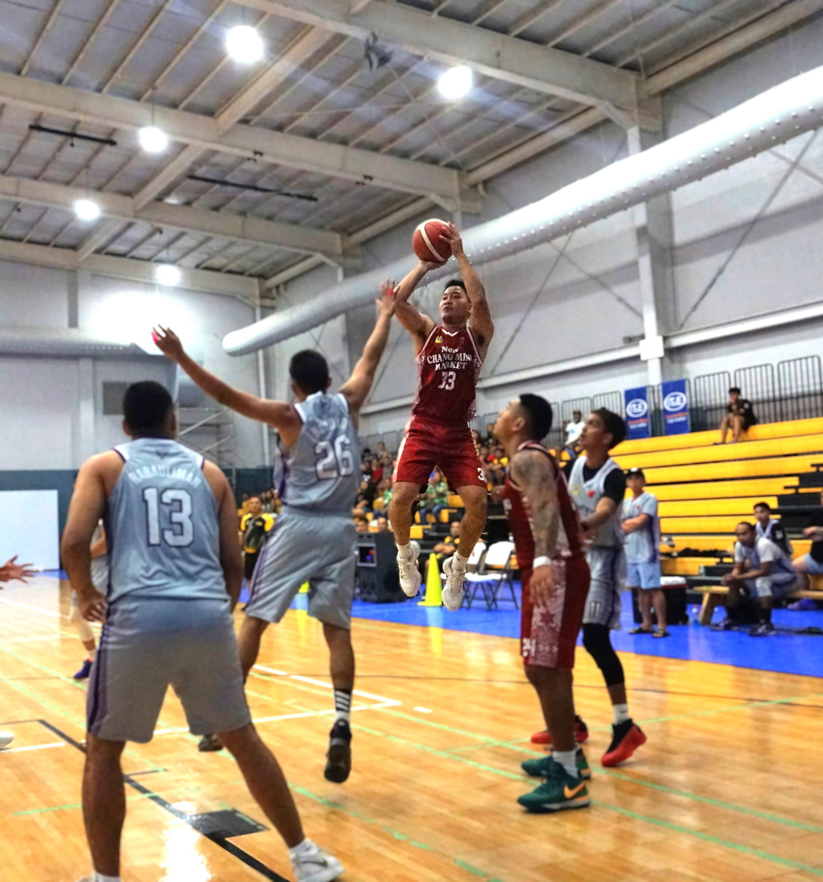 New Changming Market's Coby Santos takes the off-balanced shot during a championship game against Priority Care in the open division of the 2025 IT&E-United Filipino Organization Basketball League at the Ada gym on Saturday.Photo by James F. Sablan Jr.