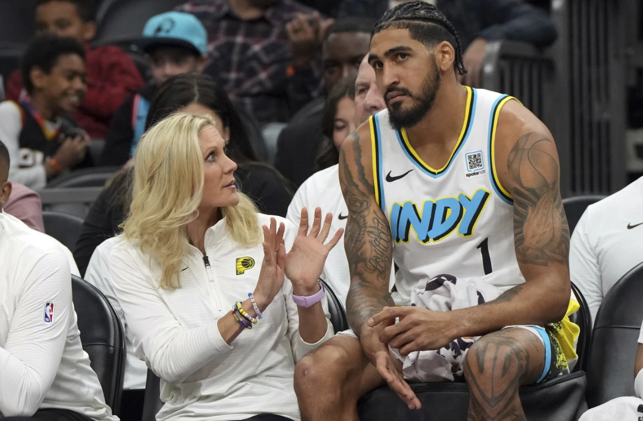 Indiana Pacers assistant coach Jenny Boucek talks to forward Obi Toppin (1) during the first half of an NBA basketball game against the Phoenix Suns, Dec. 19, 2024 in Phoenix.AP