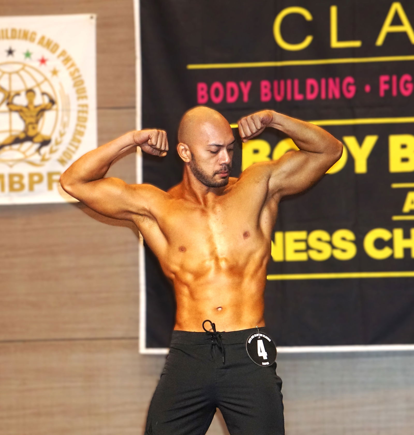 Tanielu Leuta strikes a pose in the Men's Physique category.