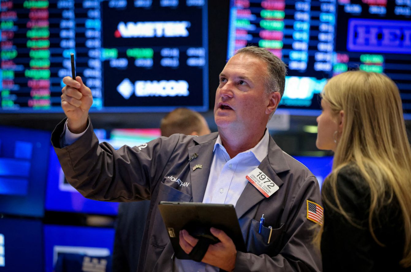 Traders work on the floor at the New York Stock Exchange in New York City, May 14, 2025.REUTERS