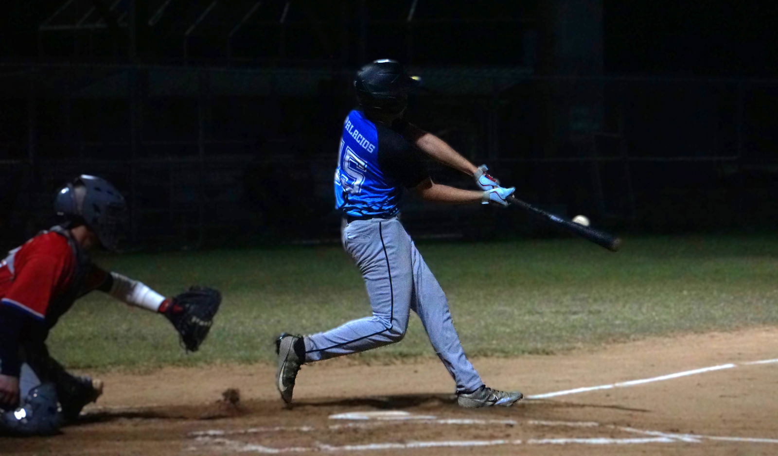 The Blue Shark's Ignacio Palacios connects a single against the Phillies during a 2025 Saipan Baseball League game at the Francisco "Tan Ko" Palacios Baseball Field on Thursday.Photo by James F. Sablan Jr.