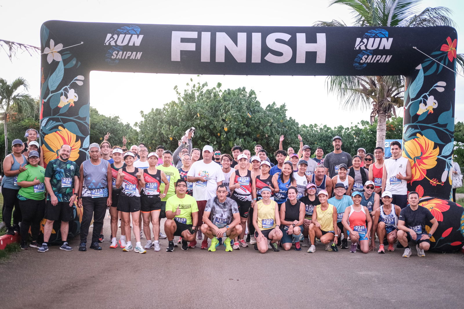 Participants pose for a group photo before the start of Run Saipan's Grotto 10K '25 on Saturday.Photo by Jon Sugutan