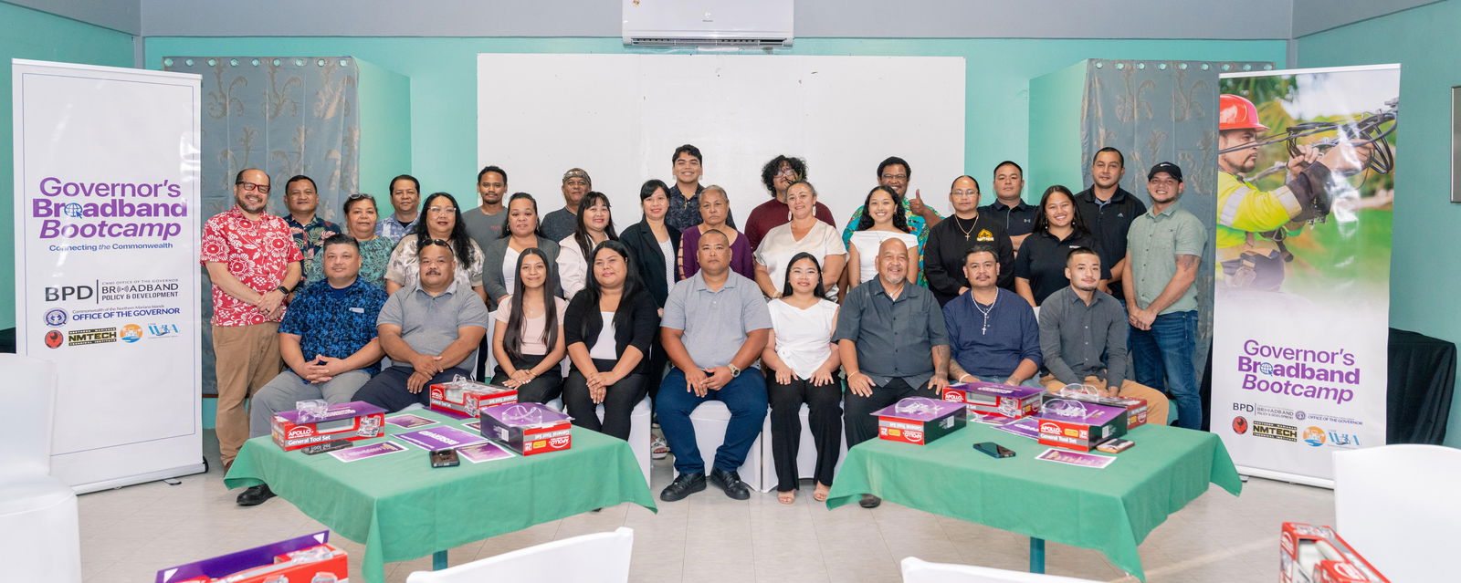 Twenty-three individuals completed the Governor’s Broadband Bootcamp on Rota on June 12, 2025.  Joining the graduates in a group photo are Northern Marianas College President Galvin Deleon Guerrero, Ed.D.; Acting Mayor of Rota and Councilman Jonovan Lizama; CNMI Office of the Governor representative Agnes Taitano; NMTech CEO Jodina Attao; bootcamp instructor Christian Camacho; CNMI Department of Labor Secretary Leila Staffler; Island Training Solutions representative Reaven Jei Cruz; and CNMI Broadband Policy and Development Office program coordinator Dayna Macaranas.NMC photo