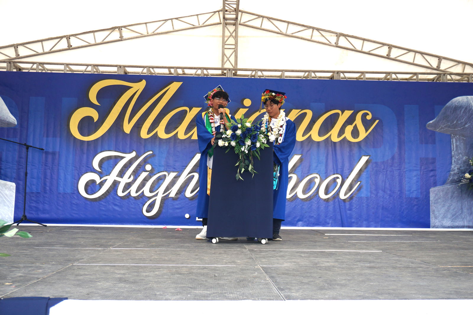 Valedictorian Jedric Aniciete, left, and salutatorian Gwanpil Son deliver a joint address. 