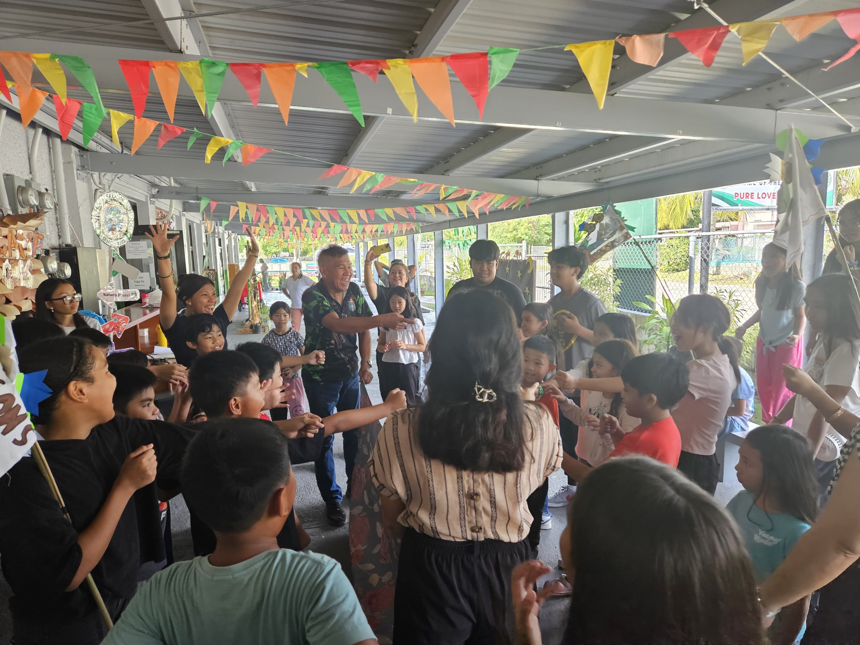 Campers compete excitedly in a fun and challenging bow and arrow game.