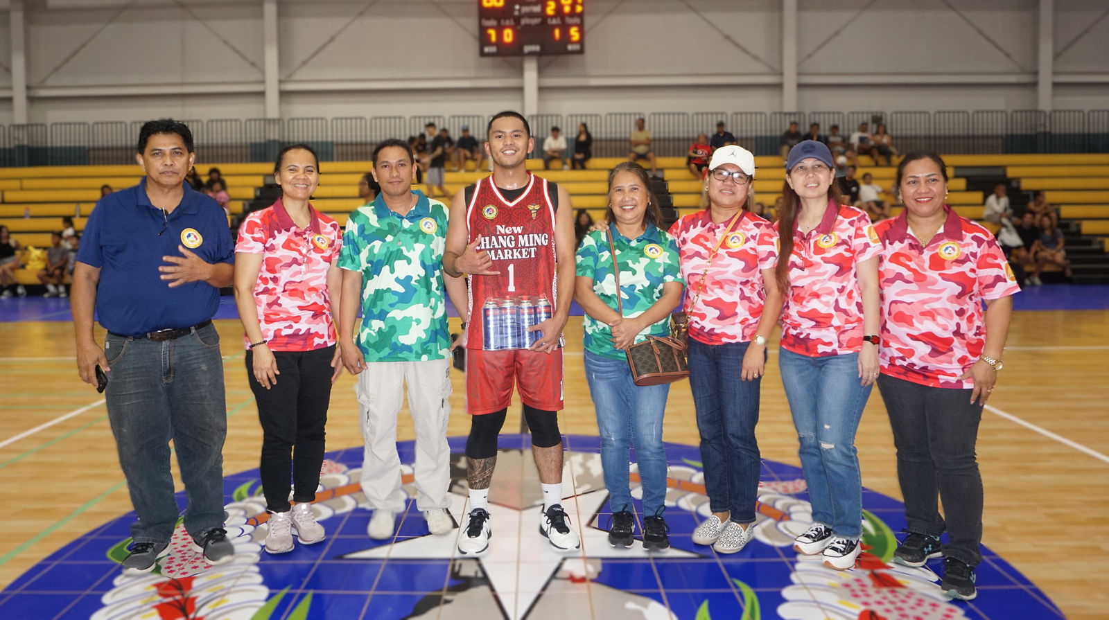 Keith Santos, center, is the open division finals MVP of the 2025 IT&E-United Filipino Organization Basketball League.