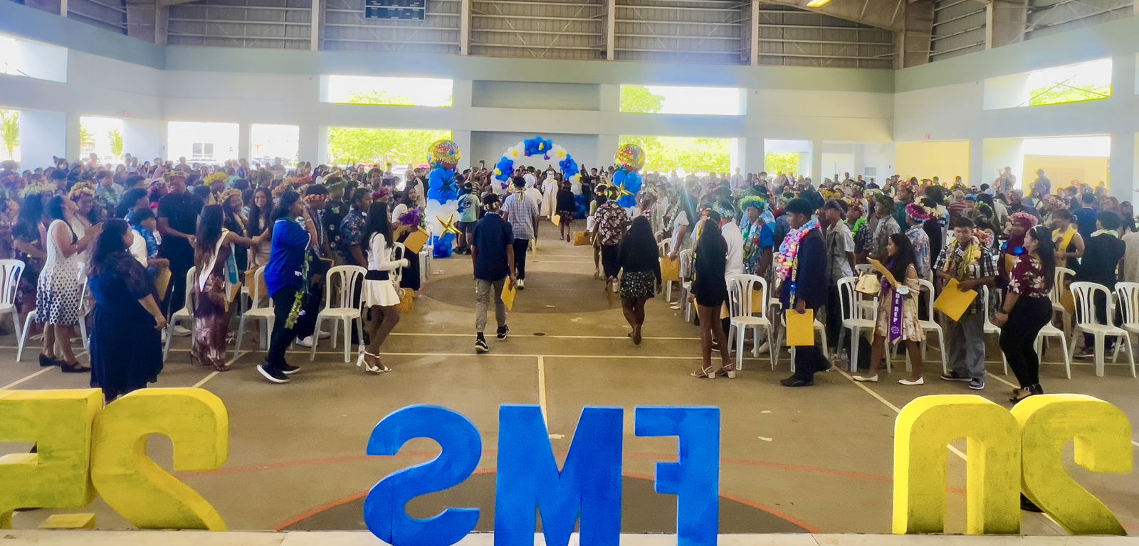 The high school-bound Napu Riders exit the Koblerville gymnasium at the conclusion of the promotion ceremony on Monday, June 2, 2025.