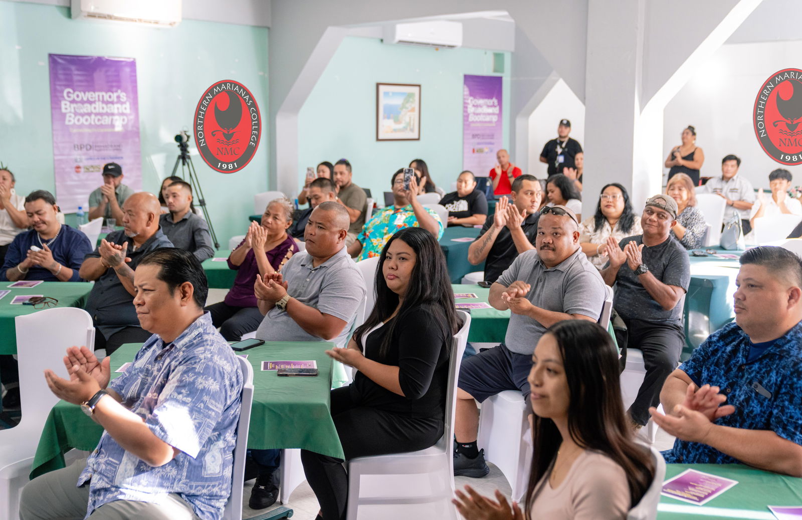 Twenty-three individuals completed the Governor’s Broadband Bootcamp on Rota on June 12, 2025.  Joining the graduates in a group photo are Northern Marianas College President Galvin Deleon Guerrero, Ed.D.; Acting Mayor of Rota and Councilman Jonovan Lizama; CNMI Office of the Governor representative Agnes Taitano; NMTech CEO Jodina Attao; bootcamp instructor Christian Camacho; CNMI Department of Labor Secretary Leila Staffler; Island Training Solutions representative Reaven Jei Cruz; and CNMI Broadband Policy and Development Office program coordinator Dayna Macaranas.NMC photo