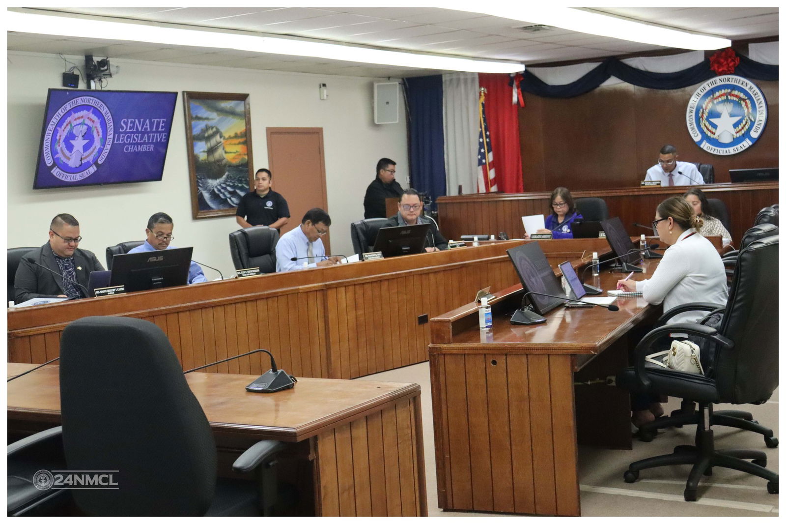 Senators review their notes during a session on Monday.Legislative Bureau photo