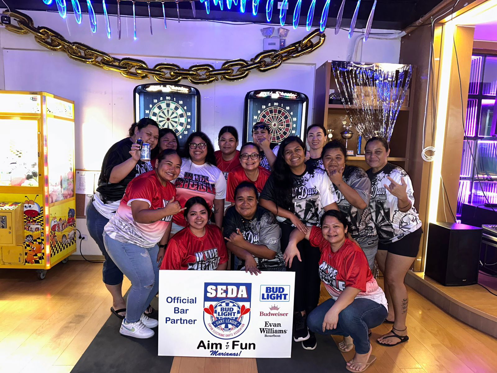Bravo Dart Daos and XXX In The Middle players pose for a group photo after their game in the Ladies Division of the 2025 SEDA Bud Light Dart League at Bravo Kitchen & Bar.Contributed photo