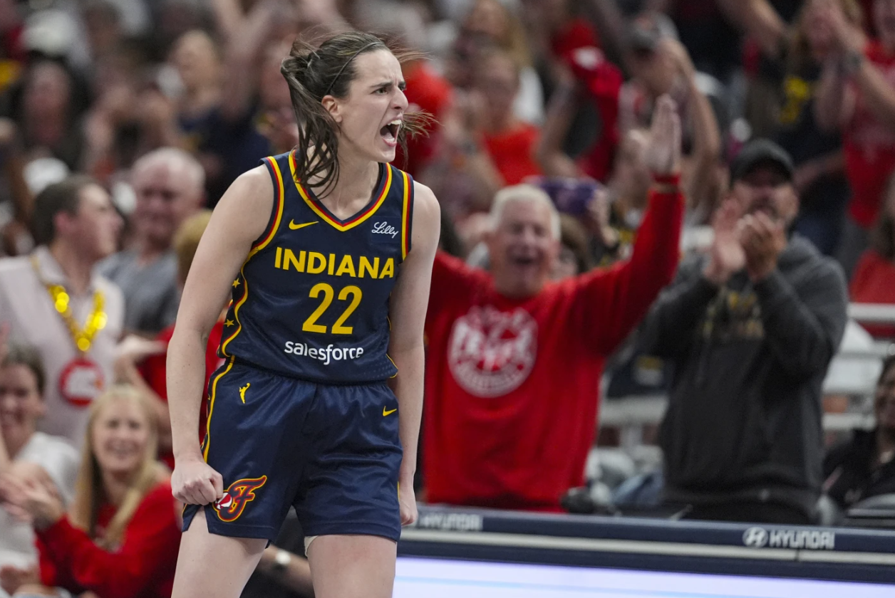Indiana Fever guard Caitlin Clark celebrates after a three-point basket against the Connecticut Sun in the second half of a WNBA game in Indianapolis, Tuesday, July 17, 2025.AP