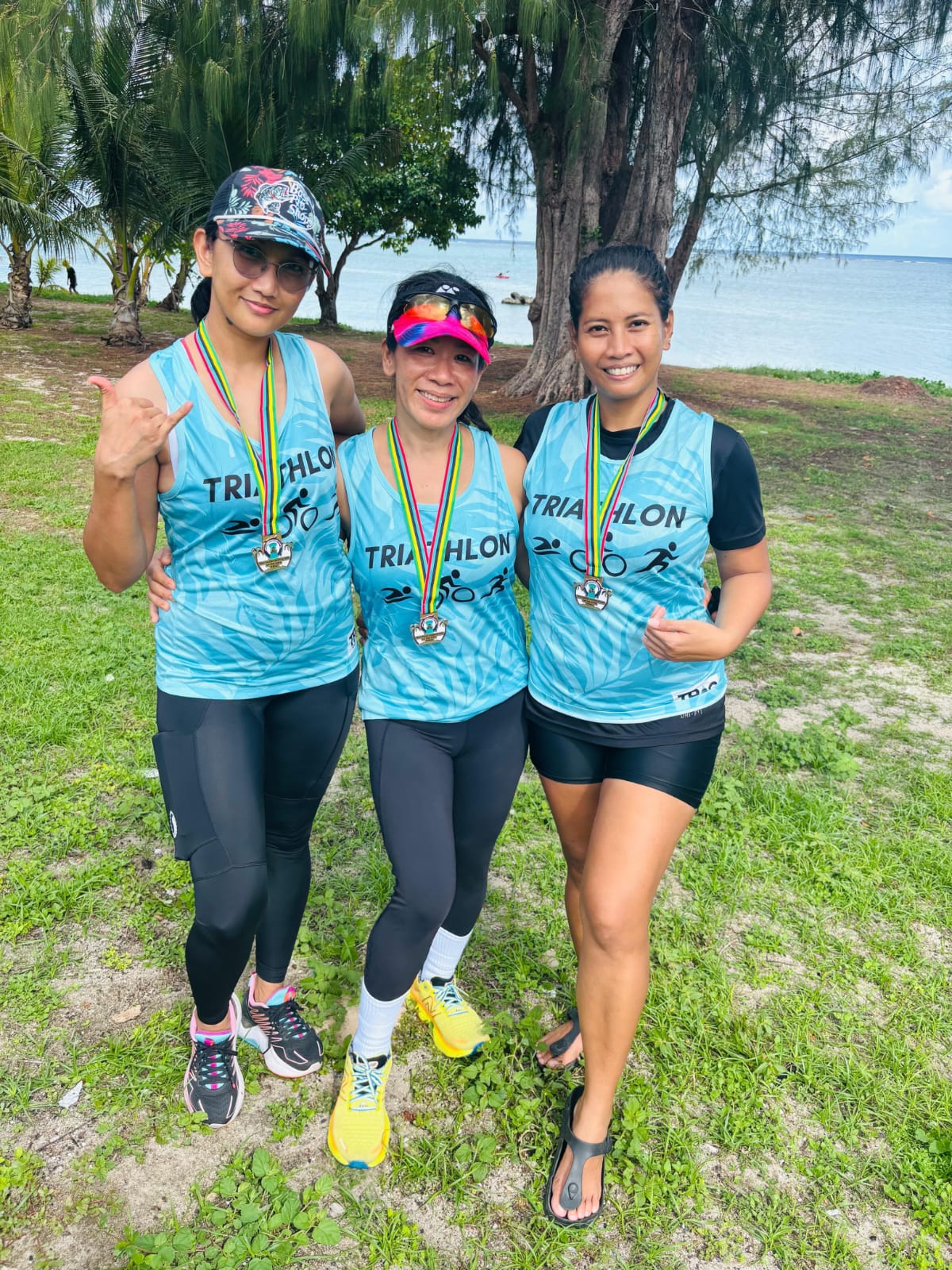 From left, Team Wonder Women’s Jay Anne Felipe biker;  Rosemarie Chisato, runner; and Kris Romero swimmer.