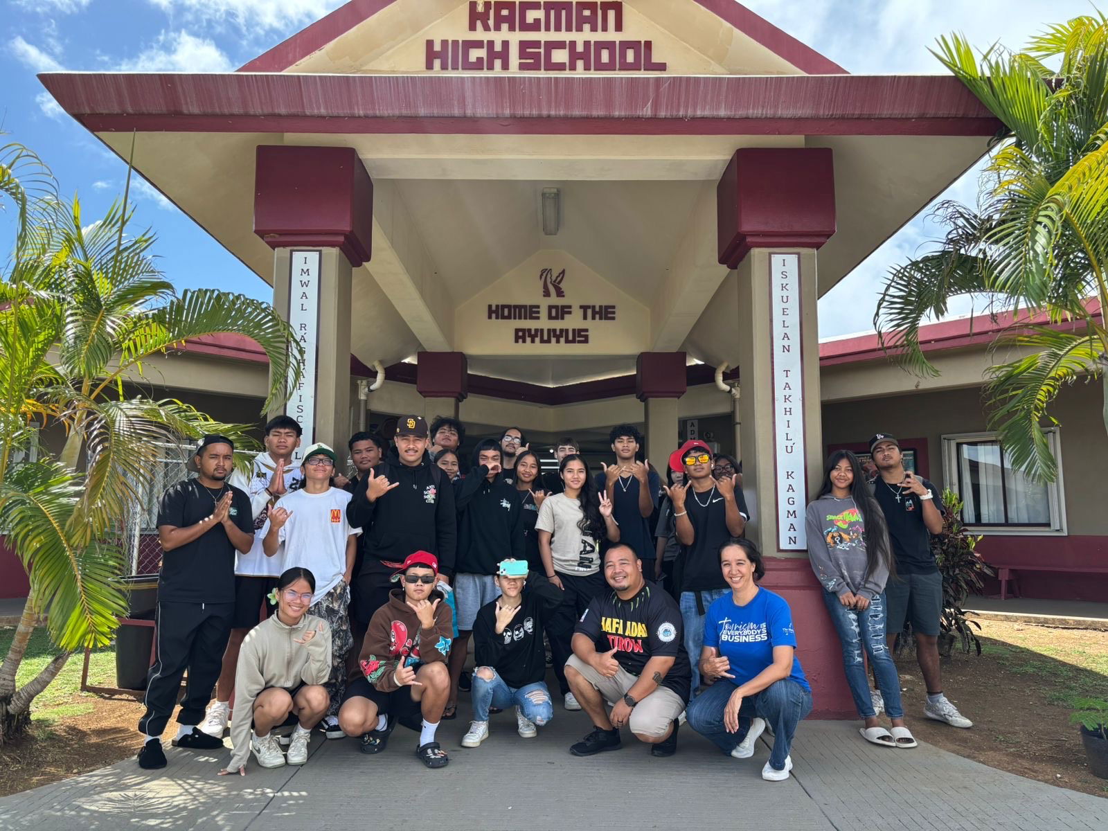 Eleventh graders at Kagman High School welcome Marianas Visitors Authority Community Projects Coordinator Sherman Santos, front row second right, and Marianas Tourism Education Council Board Member Catherine Perry, front row right, who visited the school in Kagman, Saipan, on June 4, 2025, to teach fundamentals of The Marianas tourism economy and how students can support the industry. This school year MVA and MTEC visited 21 public schools on Saipan, Tinian, and Rota.MVA photo