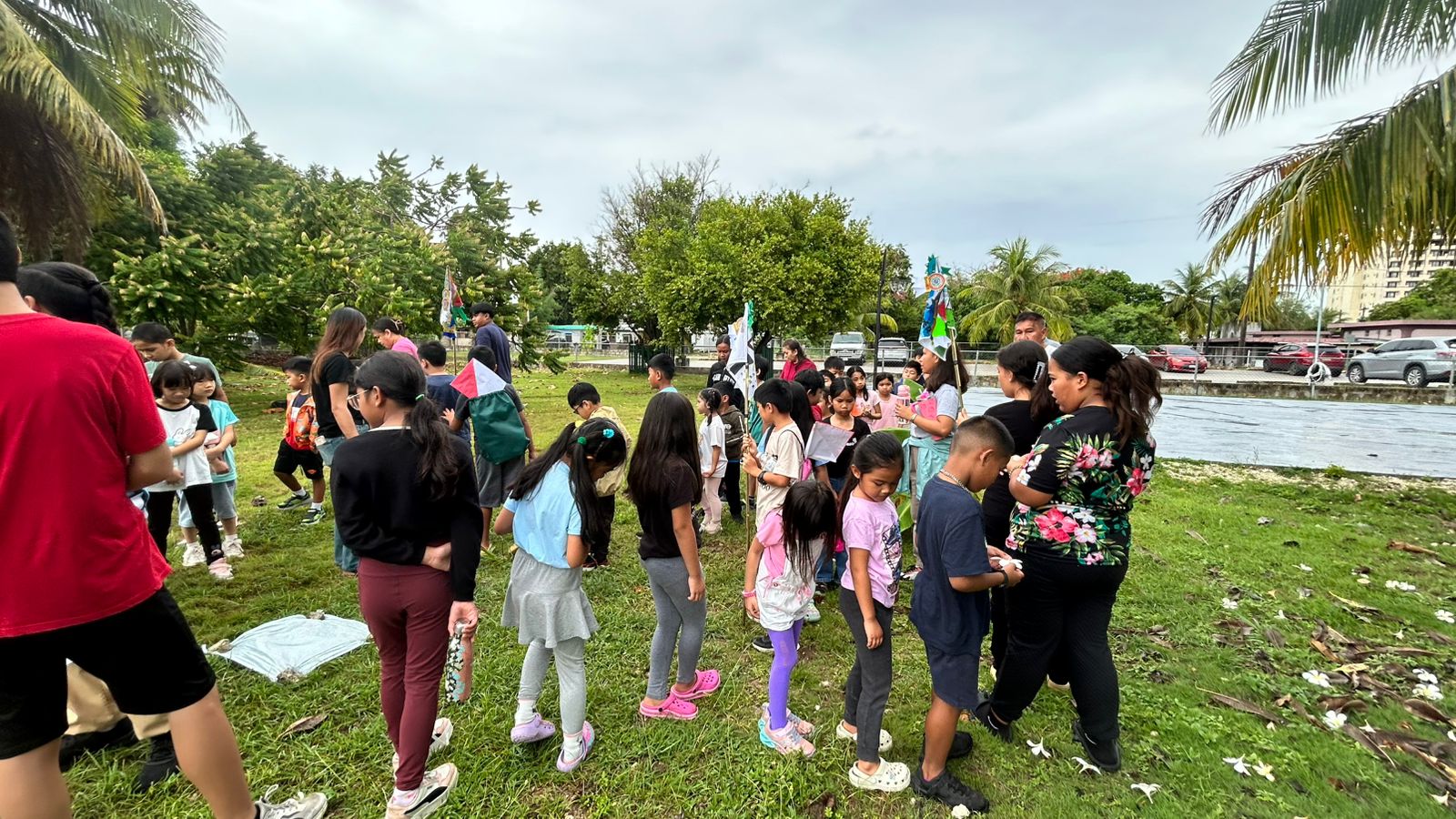 Students learn about rain harnessing and the water filtration process in a hands-on environmental science activity.