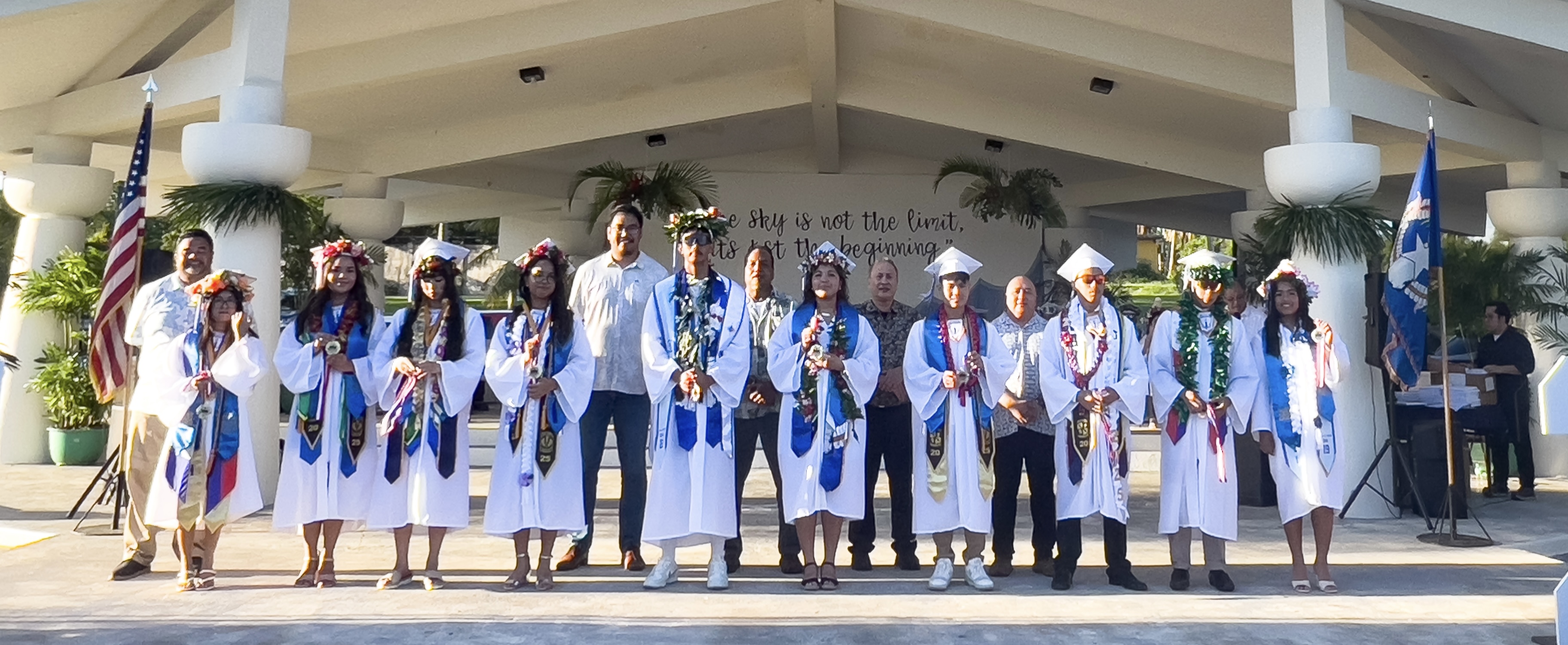 The top 10 graduates of Tinian High School’s Class of 2025 pose for a photo with education officials:  (1) Stephanie Espartero Diaz, (2) Ysabella Nikonia Rita Villagomez Palacios, (3) Jaydoria Rolliana Palacio Cruz, (4) Sofia Allyssa Balagtas Del Rosario, (5) Jasper Manibusan Borja, Jr., (6) Annabel Ashtyn Reyes Kiyoshi, (7) Hong Sheng Zhang, (8) Noah Richard Sakisat Cepeda, (9) Abiel Bawalan Erickson, and (10) Abbygaile Matias Ong.