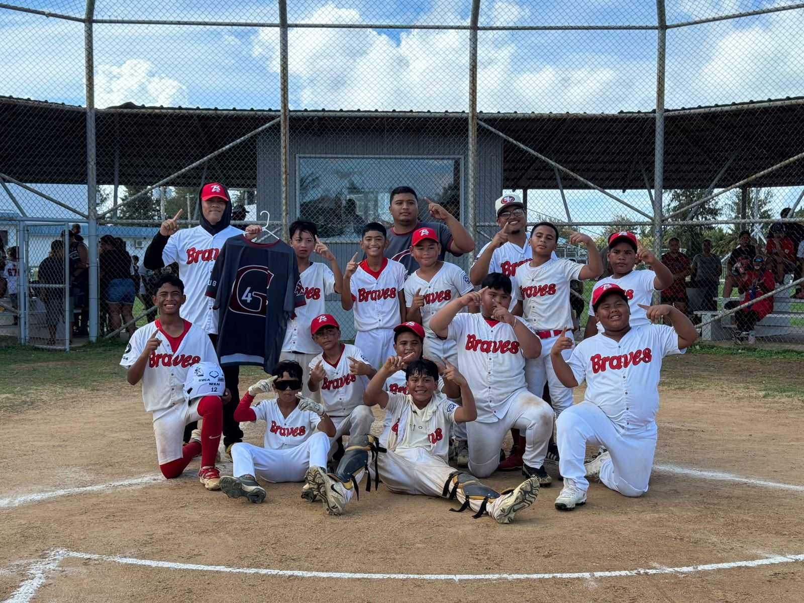 The Braves pose for a photo after winning the major division championship of the 2025 Saipan Little League Baseball at the Miguel "Tan Ge" Pangelinan Ballfield on Sunday.Contributed photo