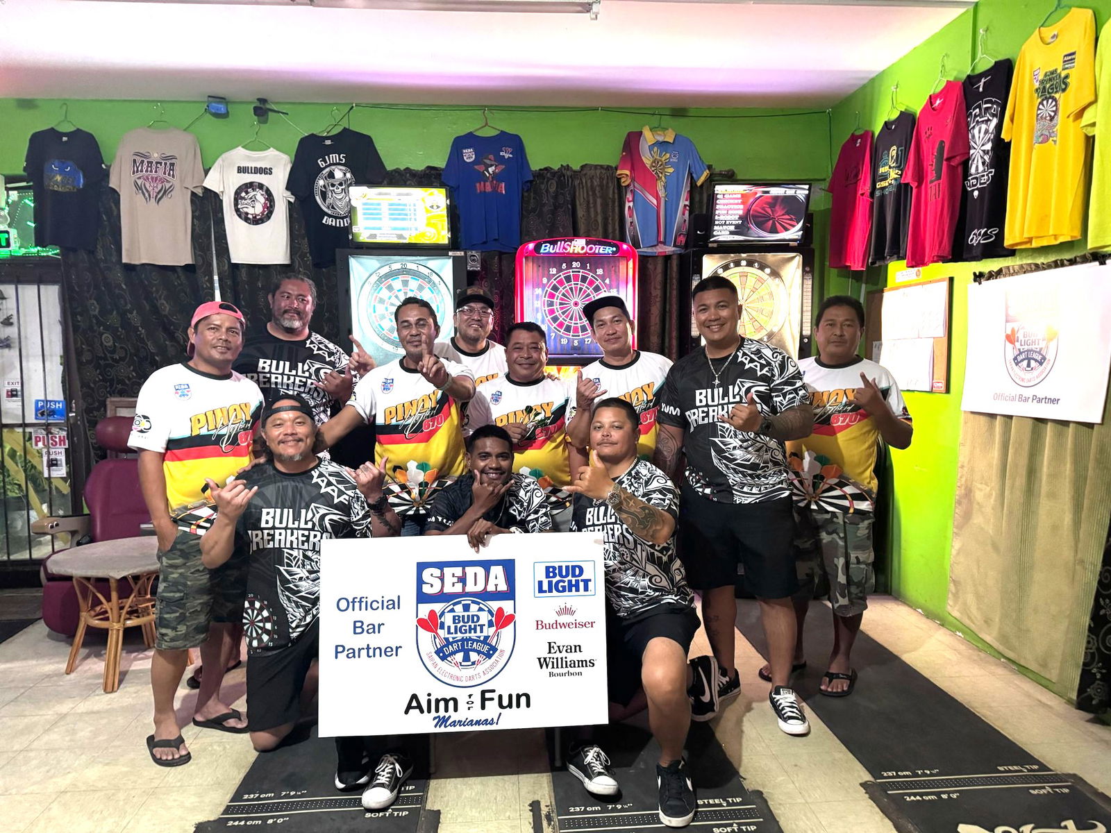 Tom Yum Bull Breakers and 6JMS Pinoy Hybrid 670 players pose for a photo after their match in the A Division of the 2025 SEDA Bud Light Dart League at the 6JMS Sports Bar on Monday night.Contributed photo