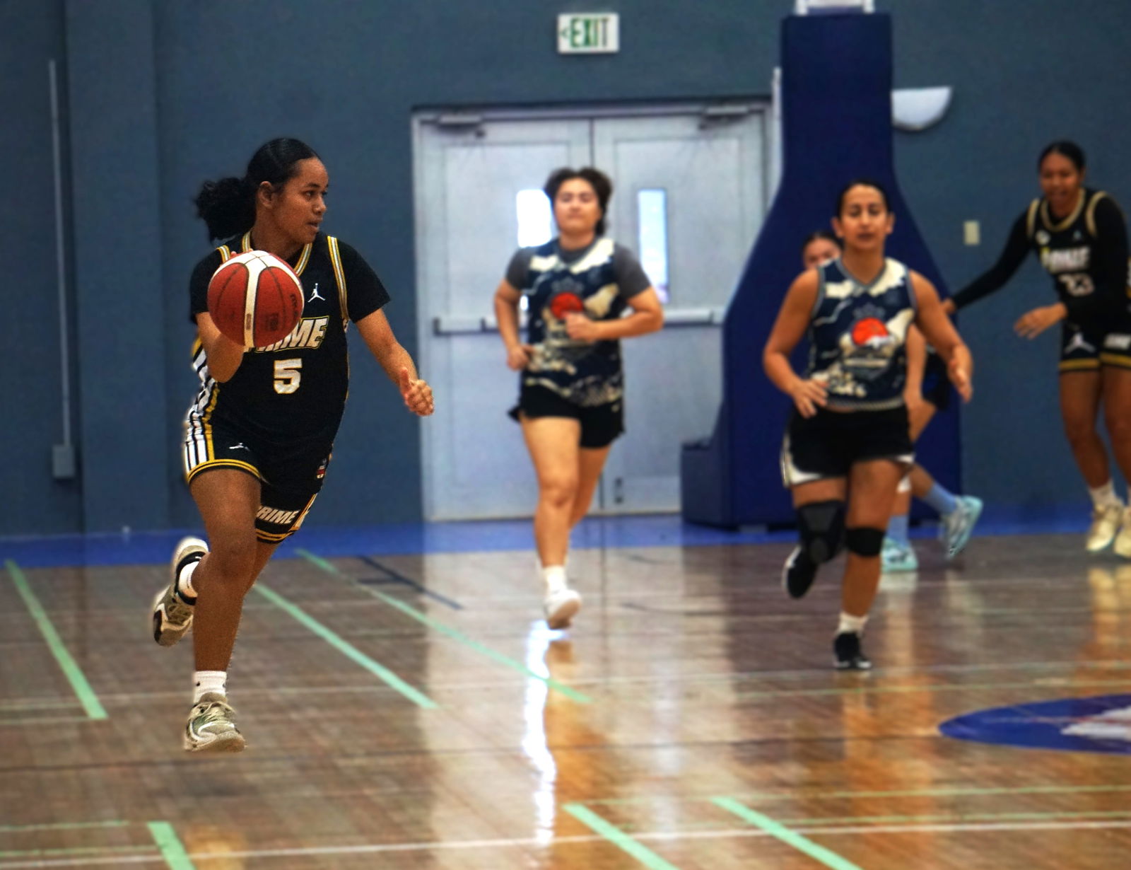 Prime's Aiyana Fatialofa dribbles forward for a fastbreak attempt during a game against the Hericanes in the Ladies Division of the 2025 Allied Pacific Environmental Corporation Basketball League  at the Ada gym.Photo by James F. Sablan Jr.