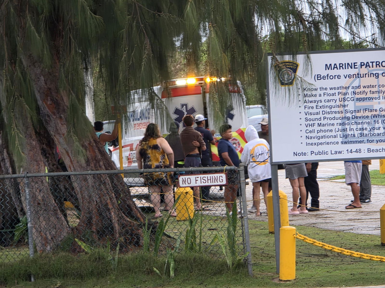The rescued surfer was assessed by medics at Smiling Cove Marina.Photo by Bryan Manabat