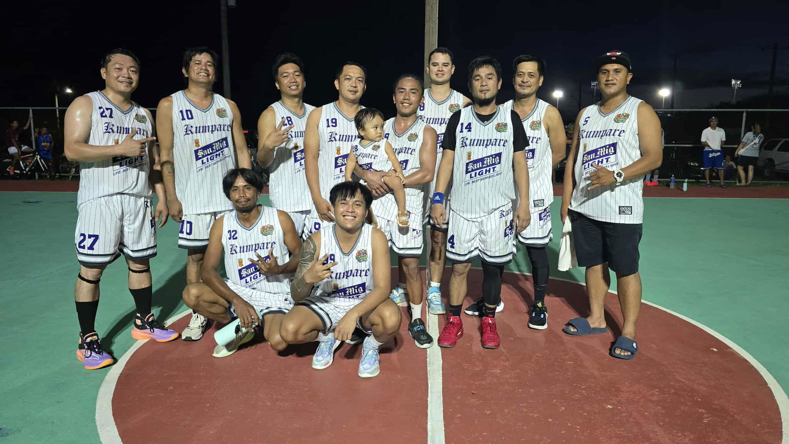 The Kumpares pose for a group photo after a B Division game of the E-Sports CNMI Invitational Basketball League 2025 at the Koblerville basketball court.Contributed photo