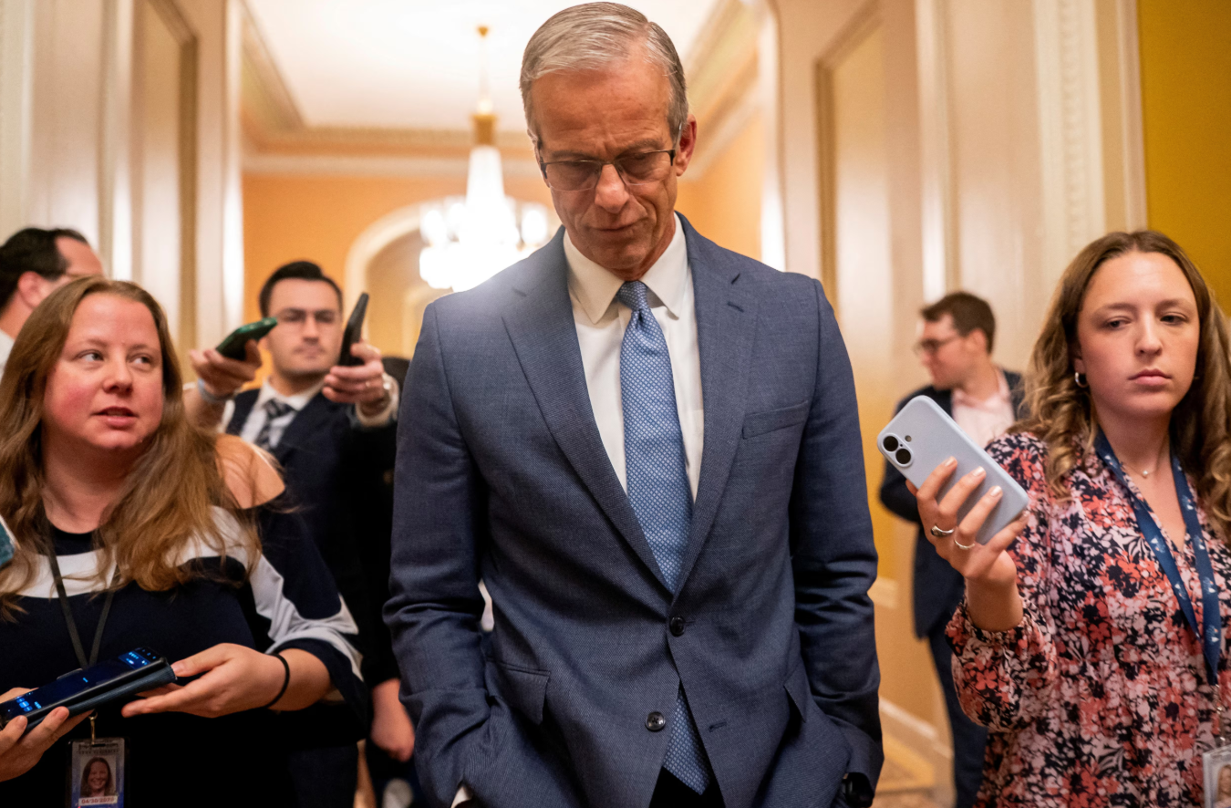 U.S. Senate Majority Leader John Thune, R-SD, is interviewed by reporters as he walks to the Senate floor as Republican lawmakers try to pass President Donald Trump's sweeping spending and tax bill, on Capitol Hill in Washington, D.C., July 1, 2025. REUTERS