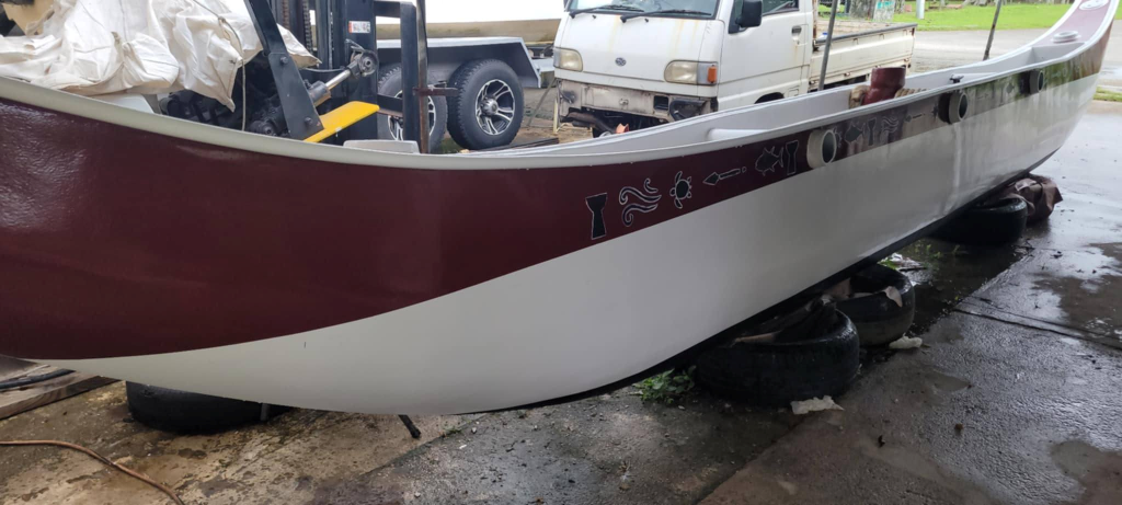 The mainhull of Keith Quintanilla's personal canoe, fabricated on Guam, features Chamorro-themed designs.