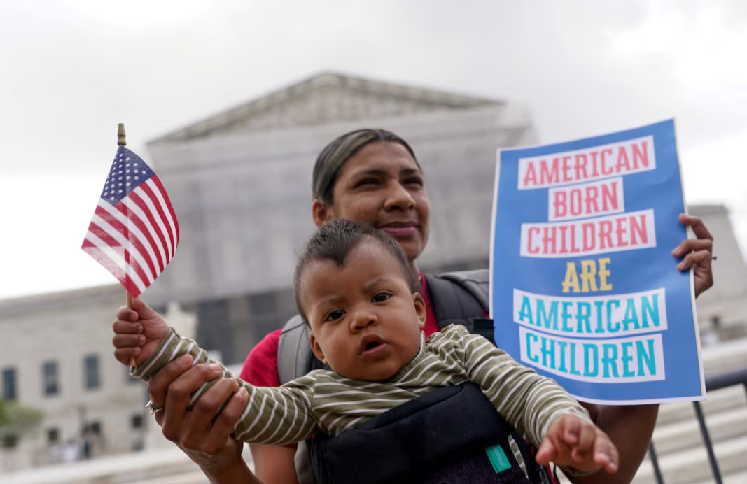 Demonstrators rally on the day the Supreme Court justices hear oral arguments over President Donald Trump's bid to broadly enforce his executive order to restrict automatic birthright citizenship, during a protest outside the U.S. Supreme Court in Washington, D.C., May 15, 2025.REUTERS