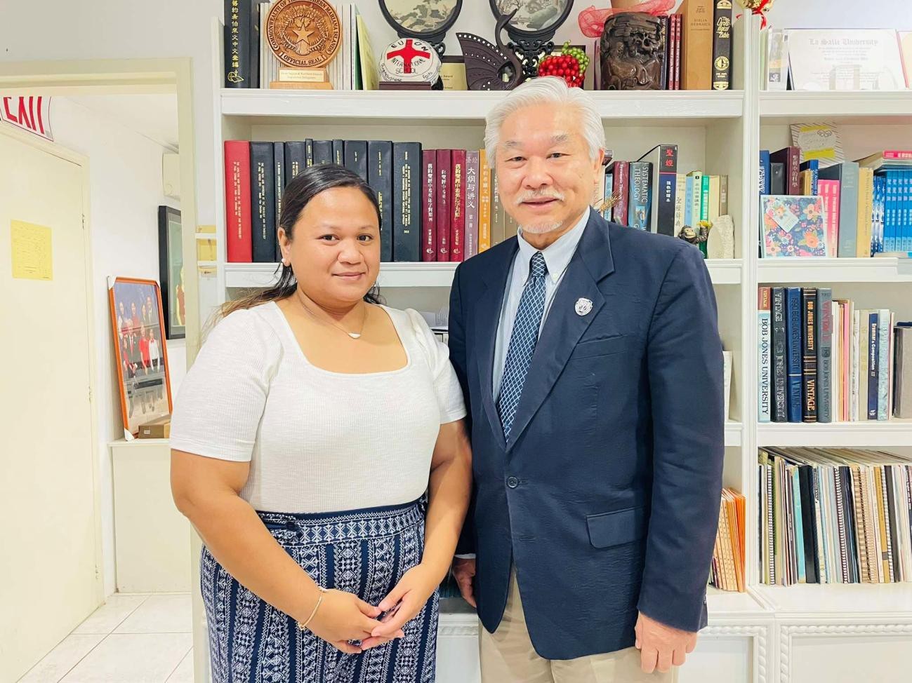 Nicole Marie Hebron Deleon Guerrero, left, with EUCON President Dr. Christian Wei.EUCON photo